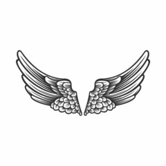 Fototapeta premium A pair of bird wings. Angel. Vector illustration for tattoo. Element for wood carving.