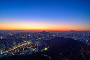 City scape night view of Seoul,Korea at sunrise time from the top of mountain