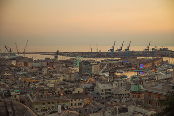  stunning panoramic aerial view of the port of Genoa In the evening