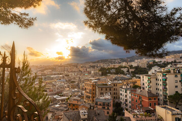 Fototapeta na wymiar spectacular views of the historic city center of Genoa from Castelletto at sunset