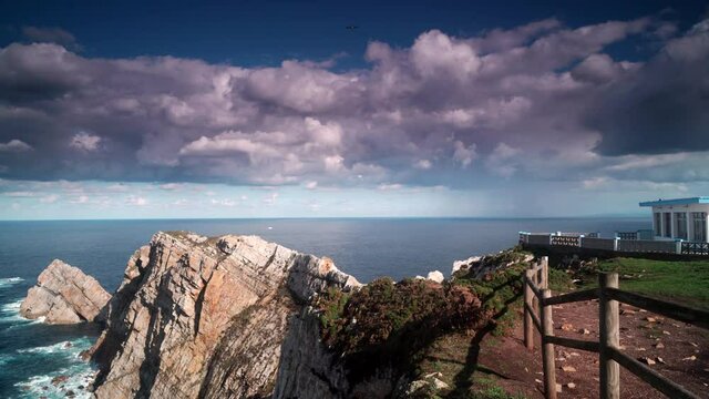 Seascape of Atlantic ocean and Asturias rocky coast at Cape Penas. Sea shore with high cliffs in north Spain.