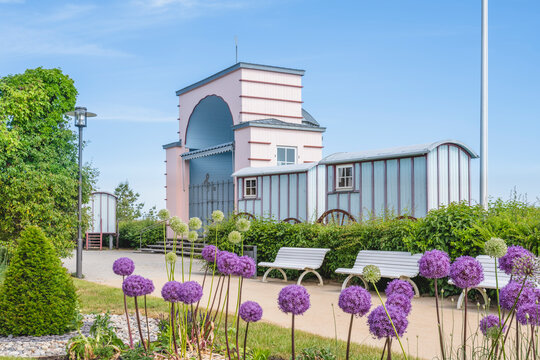 Germany, Mecklenburg-Western Pomerania, Heringsdorf, Flowers blooming in front of Konzertmuschel Bansin bandshell
