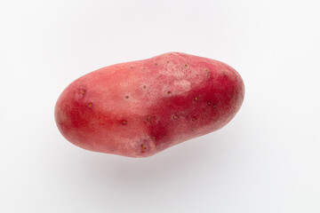 Red potato isolated on white background.