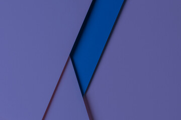 Abstract colored paper geometry composition background in very peri, purple color. Top view