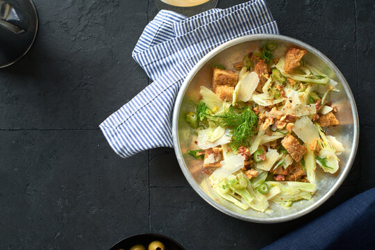 Fennel salad with parmesan cheese, walnuts and croutons