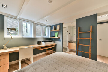 Modern bedroom with working table and shelves