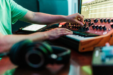 DJ working on music in studio