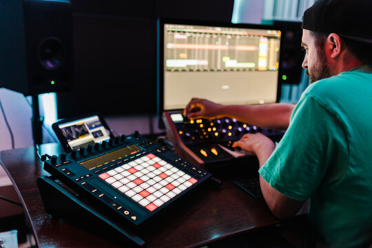DJ mixing music in recording studio