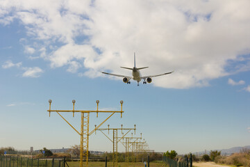 Beacons with lights, marking the entrance to the aircraft for landing on the airport runway.