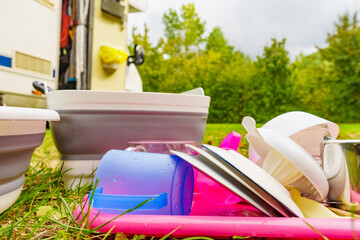 Clean dishes drying on fresh air, camping outdoor