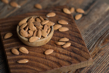 almonds on a brown wooden