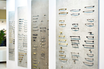 Metal handles for furniture in store