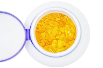 Fish oil softgel capsules in a bottle