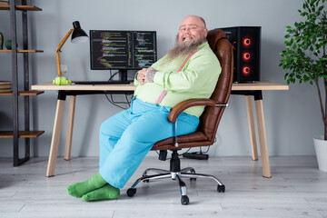 Profile side view portrait of attractive cheerful guy ceo boss chief tech manager sitting in chair...