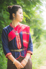 Portrait of asian girl with Thai local traditional dress, famous in countryside of Thailand 