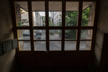 Selective blur on the doorway and the doorstep of a multi storey multiple flat buildings in...