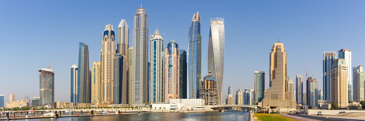Dubai Marina and Harbour skyline architecture wealth luxury travel in United Arab Emirates panorama