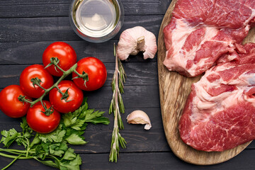 meat steak on wooden board ingredients top view food