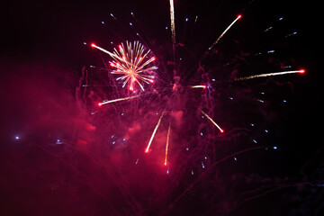Obraz premium Fireworks at New Year. Abstract holiday background.