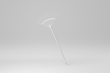 Metal rake on white background. minimal concept. monochrome. 3D render.