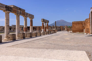 Forum of city destroyed by the eruption of the volcano Vesuvius, view of mount Vesuvius, Pompeii, Naples, Italy - obrazy, fototapety, plakaty