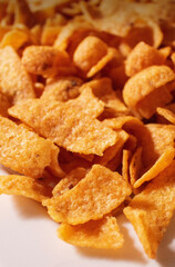 vertical perspective view of corn chips snack junk food background