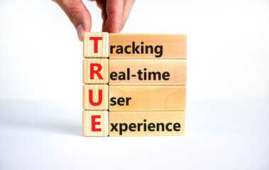 TRUE tracking real-time user experience symbol. Concept words TRUE tracking real-time user...