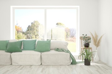 Stylish room in white color with sofa and autumn landscape in window. Scandinavian interior design. 3D illustration