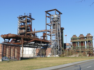 Fototapeta na wymiar The industrial ruins of the blast furnaces at the Phoenix plant are part of the Industrial Culture Route in Dortmund, North Rhine-Westphalia, Germany Industrieruinen der Hochöfen des Werkes Phönix