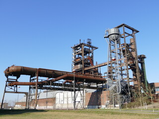 Fototapeta na wymiar The industrial ruins of the blast furnaces at the Phoenix plant are part of the Industrial Culture Route in Dortmund, North Rhine-Westphalia, Germany Industrieruinen der Hochöfen des Werkes Phönix