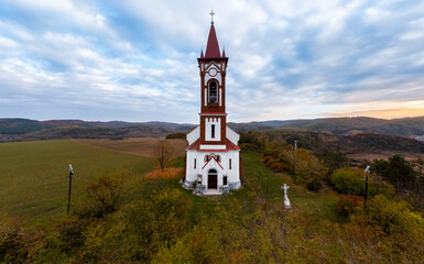Fototapeta na wymiar The Heart of Jesus christian church in Soshartyan town Hungary. built was 1906. The most beautiful church in Nograd county.