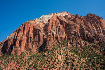 Zion Utah landscape photos including mountains, trees, rocks and blue sky