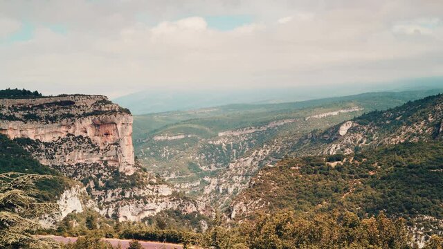 Timelapse of clouds moving over mountain landscape, Gorges de la Nesque, Vaucluse in Provence, southern France. View from viewpoint Belvedere de Saint Hubert.
