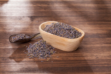 lavandula - aromatic plant lavender seeds on wooden background