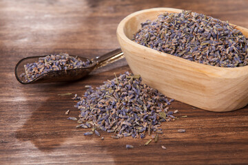lavandula - aromatic plant lavender seeds on wooden background