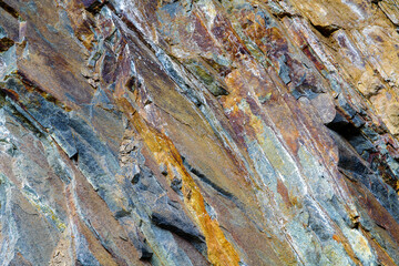 Colourful geological rocky background mineral erosion
