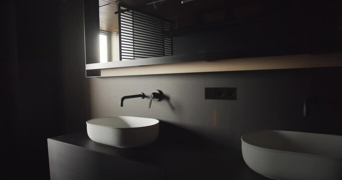 The real modern minimalist bathroom with black and gray tone, luxury home