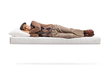 Senior man sleeping on a floating matress