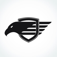 stylized silhouette eagle shield logo