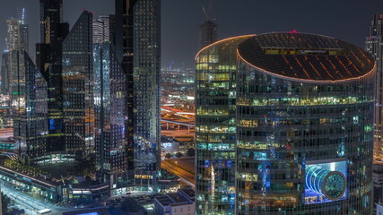 Obraz premium Dubai international financial center skyscrapers aerial night timelapse.