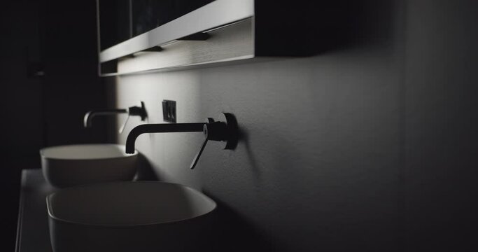 The real modern minimalist bathroom with black and gray tone, luxury home
