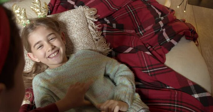 Happy little children playing at home on Christmas eve