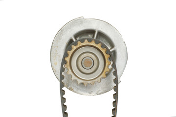 A gear wheel of an automotive unit with a toothed belt put on it. Isolate on white.