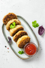 Tuna fritters with ketchup. Space for text.