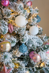 white balls on a decorated Christmas tree  