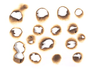 Set of burnt holes of paper, texture and background, top view