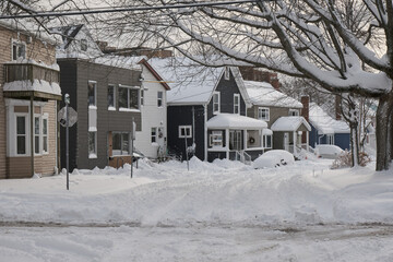 Halifax, Canada covered in snow after first snowstorm of season. Snow covered residential street - obrazy, fototapety, plakaty