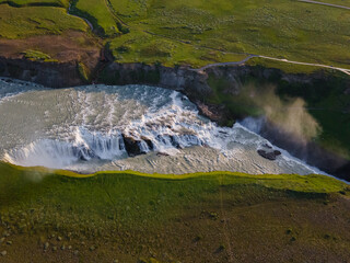 Beautiful aerial view of Iceland Gullfoss waterfall with a rainbow in the Golden Circule