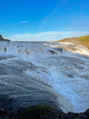 Beautiful aerial view of Iceland Gullfoss waterfall with a rainbow in the Golden Circule