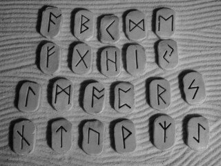 Anglo Saxon Old English runic alphabet uses symbols that represent letters, sounds and words in a version of ancient Germanic writing.